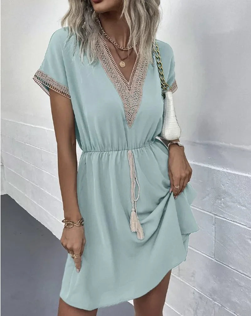 Women's summer dress, plain, with short sleeves and a V-neck