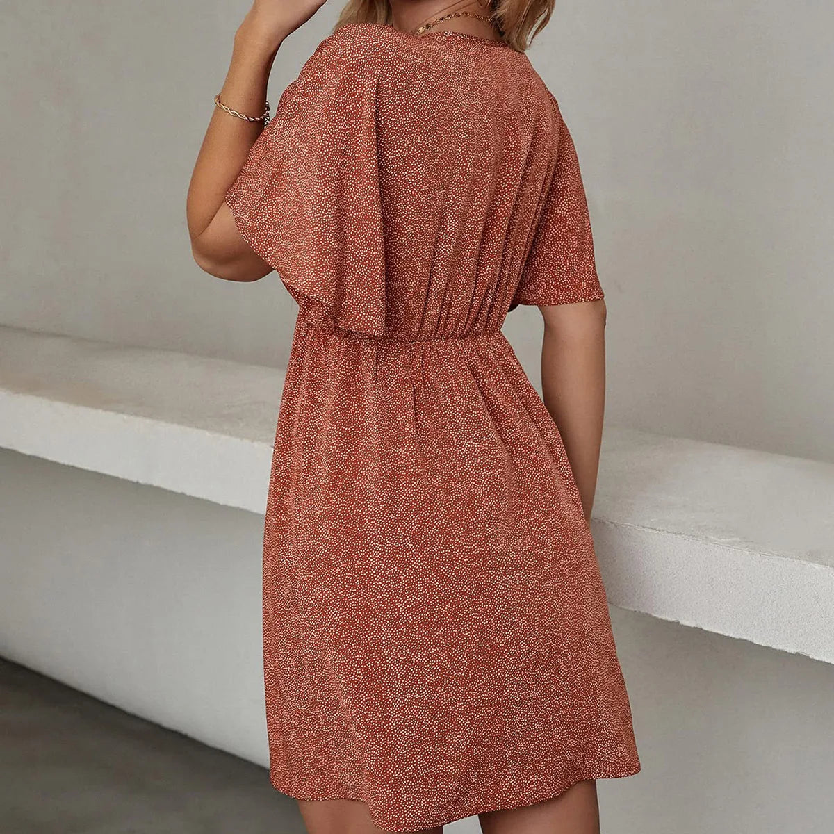 Women's short-sleeved dress with a V-neck, casual and loose style