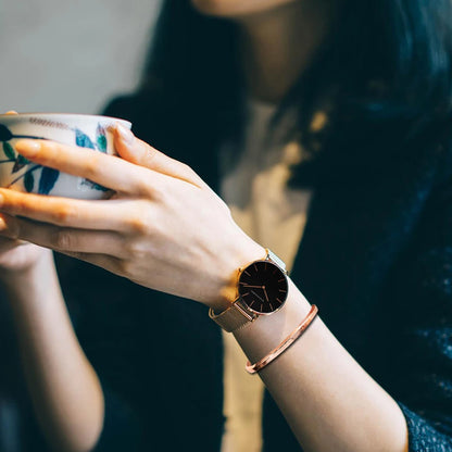 Women's watch with Japanese quartz movement, simple design in gold-tone stainless steel