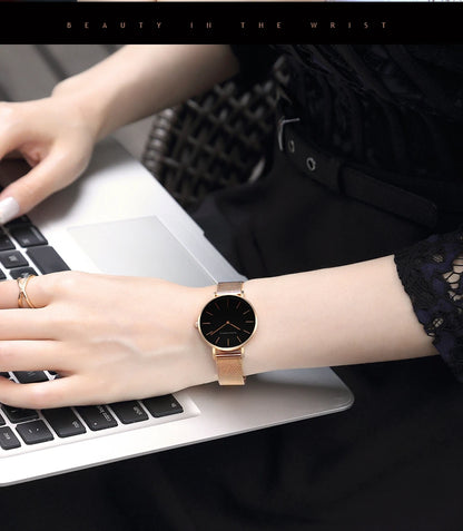 Women's watch with Japanese quartz movement, simple design in gold-tone stainless steel