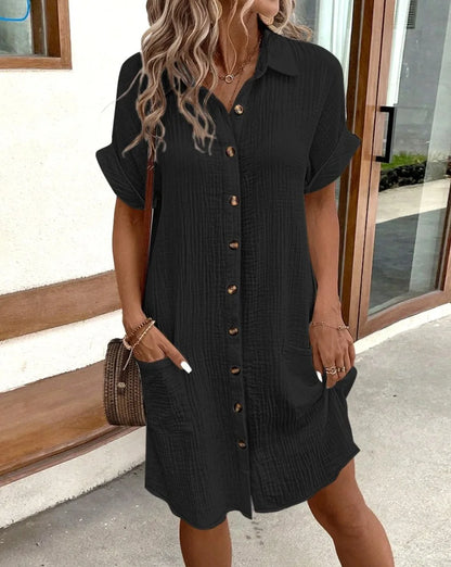 Women's dress, plain with a fold-down collar, single-breasted closure, and loose fit