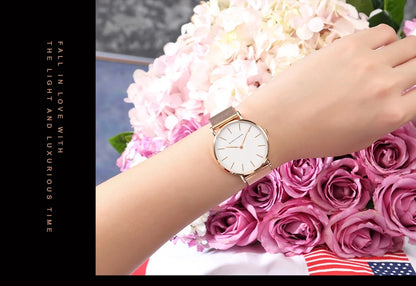 Women's watch with Japanese quartz movement, simple design in gold-tone stainless steel