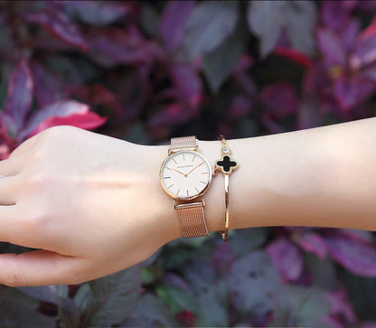 Women's watch with Japanese quartz movement, simple design in gold-tone stainless steel