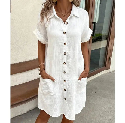 Women's dress, plain with a fold-down collar, single-breasted closure, and loose fit